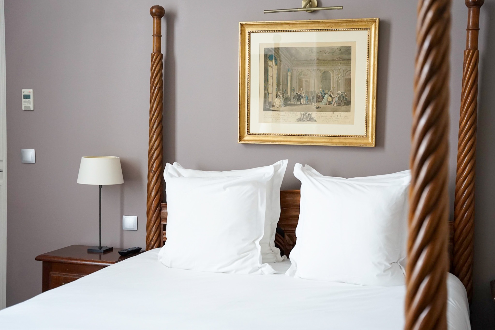 French Flair Burgundy Bedroom Bed at Château Sainte Sabine