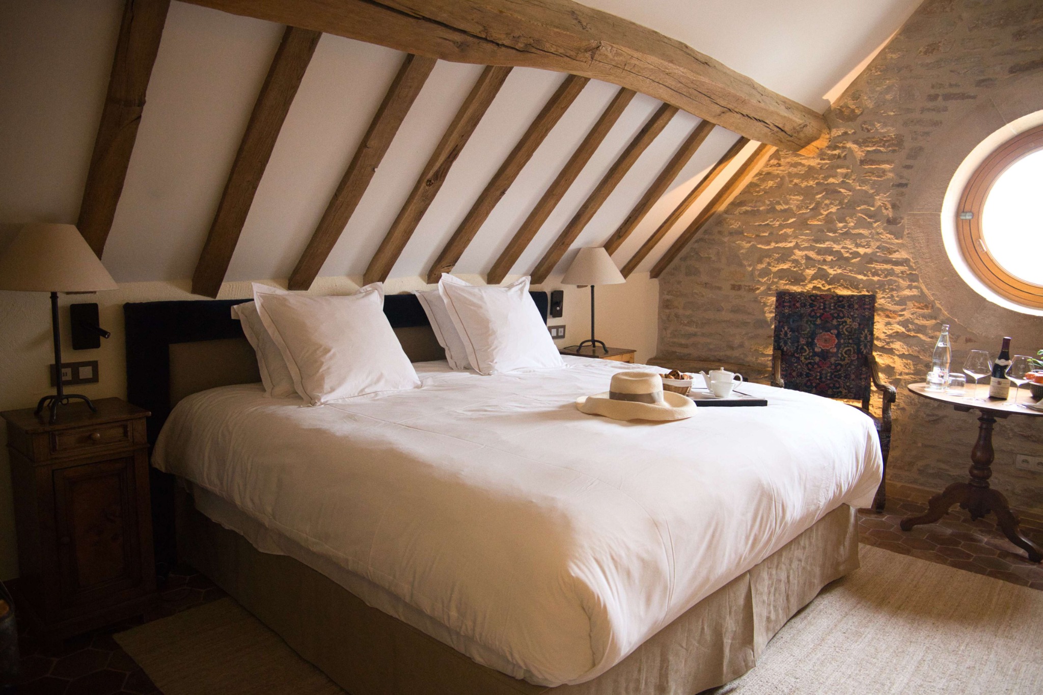 French Flair Burgundy Bedroom at Hostellerie de Levernois